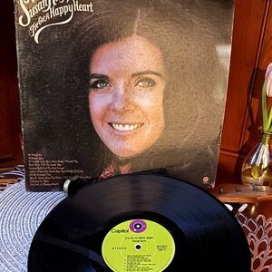 I've Got a Happy Heart" by country singer Susan Raye,